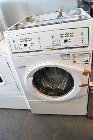 BRAND NEW SCRATCH AND DENT! Speed Queen Front Load Combo Washer and Dryer. 120/208-240 Volts. 