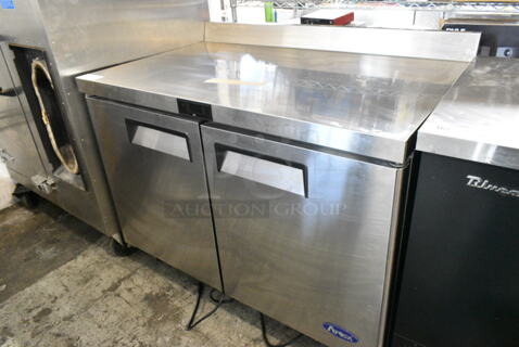 2024 Migali MGF8413GR Stainless Steel Commercial 2 Door Work Top Freezer on Commercial Casters. 115 Volts, 1 Phase. Tested and Working!