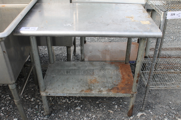 Stainless Steel Commercial Table w/ Metal Under Shelf.