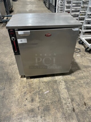 FWE Commercial Food Warming/Holding Cabinet! All Stainless Steel! With Metal Racks! On Casters! 120V! Model: HLC-SL-1826-8-CHP SN: 165031501!