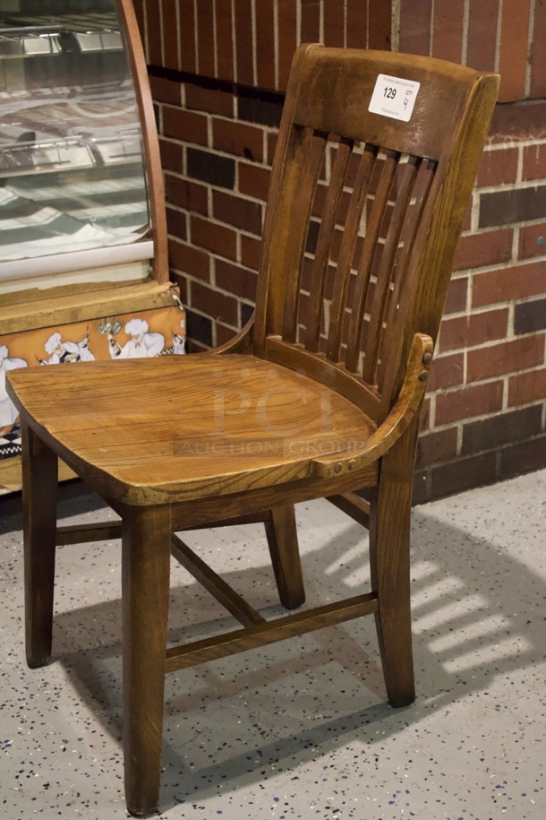 BEAUTIFUL! Set Of 4 Solid Wood Vertical Ladder Back Chairs. 18x13x35  
5x Your Bid.                      
some chairs are darker than others.