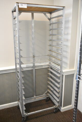 Metal Commercial Pan Transport Rack on Commercial Casters. (secondary dining room)