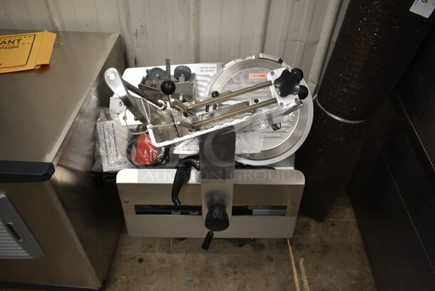 BRAND NEW SCRATCH AND DENT! 2022 Avantco ASA0012 Stainless Steel Commercial Countertop Automatic Meat Slicer. 120 Volts, 1 Phase. Tested and Working!