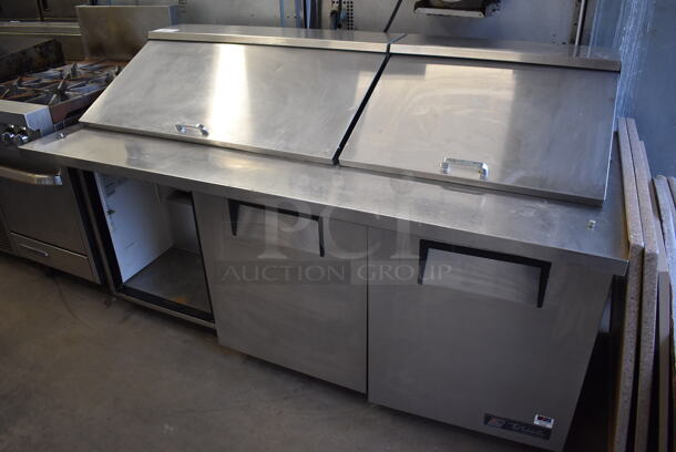 2013 True TSSU-72-30M-B-ST Stainless Steel Commercial Sandwich Salad Prep Table Bain Marie Mega Top on Commercial Casters. Missing Door. 115 Volts, 1 Phase. 72x35x44. Tested and Powers On But Does Not Get Cold