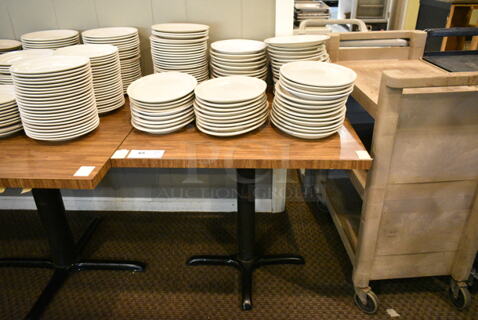 Wood Pattern Dining Height Table w/ Contents Including Ceramic Dishes. (main dining room)