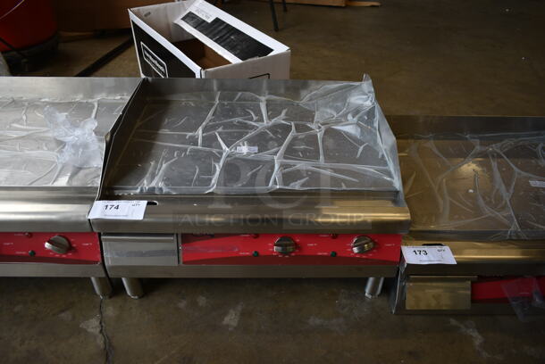 BRAND NEW SCRATCH AND DENT! 2023 Avantco 177EG24N Stainless Steel Commercial Countertop Electric Powered Flat Top Griddle. 208/240 Volts, 1 Phase.
