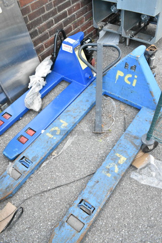 2 Metal Pallet Jacks; 4,400 Pound Capacity and 5,500 Pound Capacity. 2 Times Your Bid! 