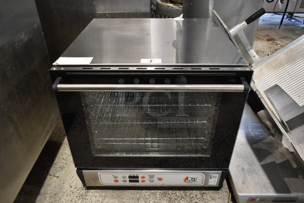 BRAND NEW SCRATCH AND DENT! Cooking Performance Group CPG 351COHD4M Stainless Steel Commercial Countertop Electric Powered Half Size Convection Oven. 208-240 Volts, 1 Phase. Tested and Working!