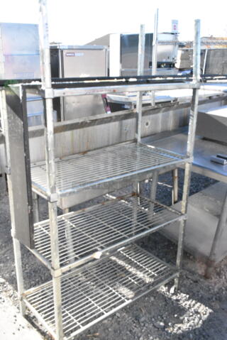 Chrome finish 4 Tier Wire Shelving Unit. BUYER MUST DISMANTLE. PCI CANNOT DISMANTLE FOR SHIPPING. PLEASE CONSIDER FREIGHT CHARGES.