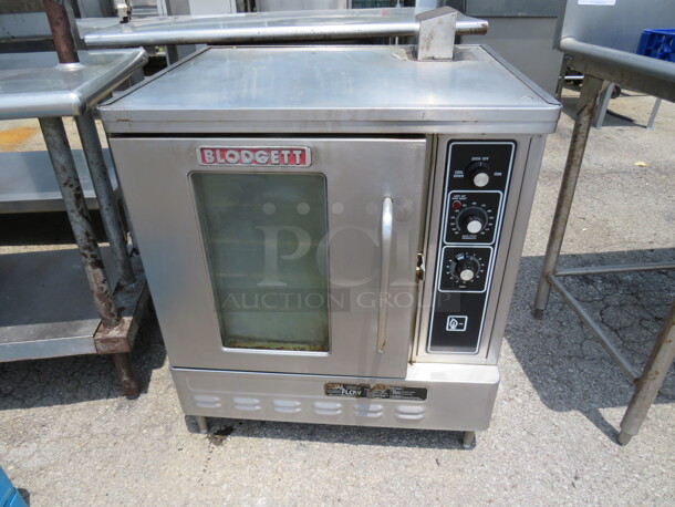 One Blodgett Half Size Electric Convection Oven With 5 Racks. 30X28X41