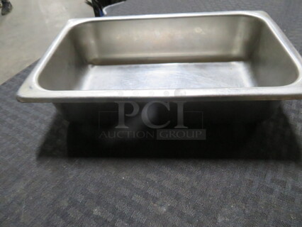 One 1/4 Size 2.5 Inch Deep Hotel Pan. 