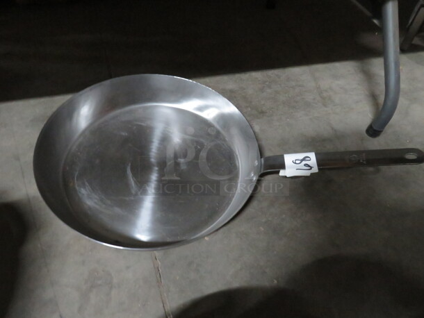 One 16 Inch Stainless Steel Saute Pan. 